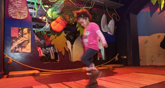 Girl jumping over bridge – Discover Story Centre