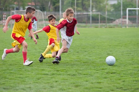 Boys playing footy