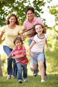 Family running in park