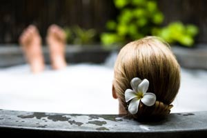 woman relaxing in a bathtub