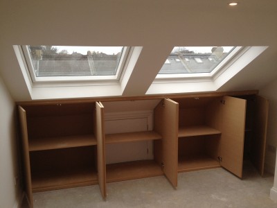 Extra storage idea of under the eaves in a loft conversion