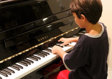 Piano Boy Playing Learning Piano Lesson