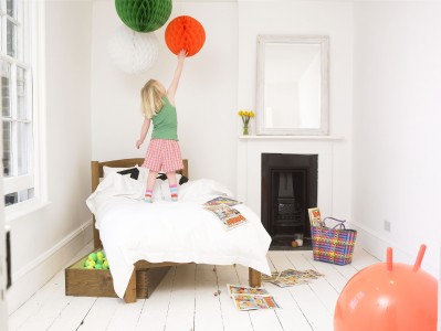 Cottage Bed with child family sleep soundly clocks change