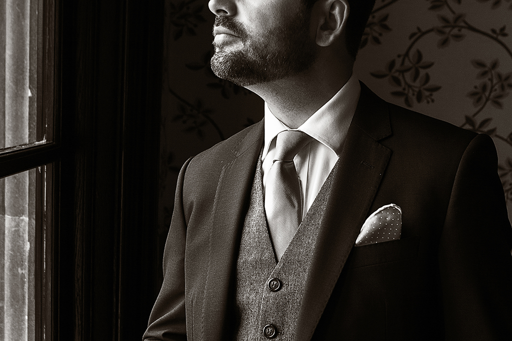 Man at window with Brandy