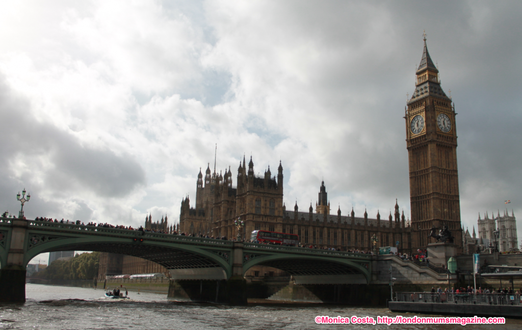 Big Ben and Westminster parliament seen from a boat 