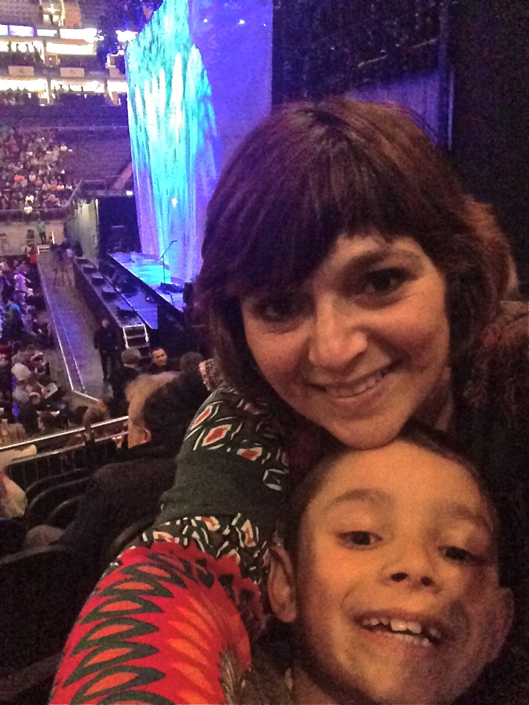 Monica editor of london mums and son Diego at Spandau Ballet gig posing for the magazine