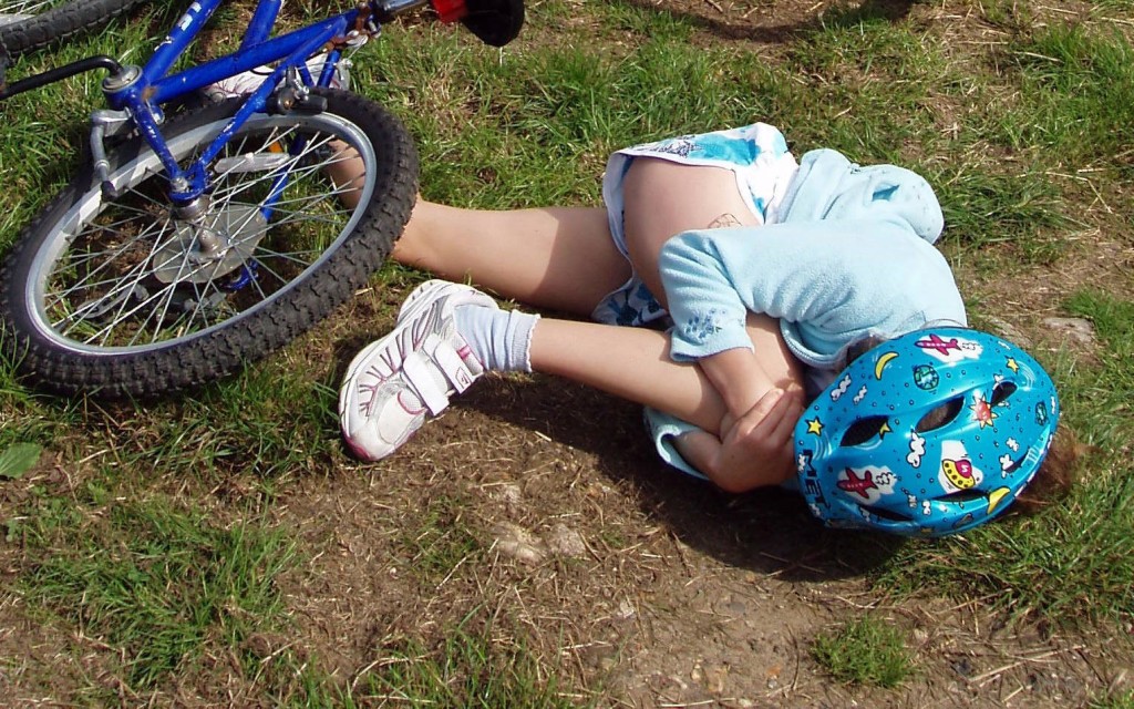 child falling off bike