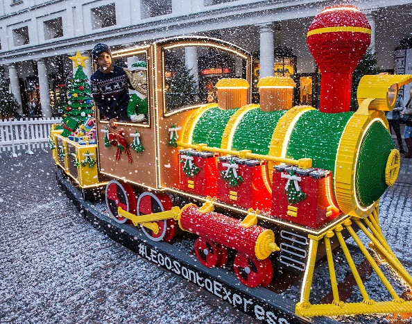 JEFF MOORE 26/11/15 "FREE FOR EDITORIAL USE " #LEGOSantaExpress The LEGO Santa Express puffed into the Covent Garden Piazza this morning to add some Christmas magic. Made with 500,000 LEGO bricks, it features three carriages, the engine and driverÕs cabin, a carriage full of presents and the final carriage is delivering the Christmas Tree. The Christmas Elf will be in charge and takes position in the driving seat. The LEGO Santa Express is complete with special effects including smoke from the funnel, sounds and lights. For more information please contact LEGO@crescendopr.co.uk
