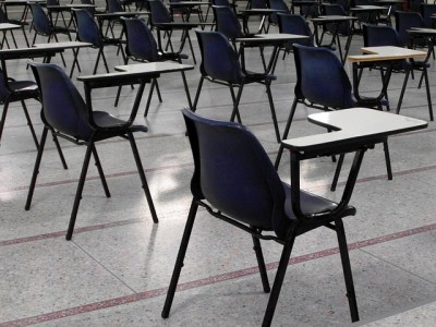 empty school desks schooling exams