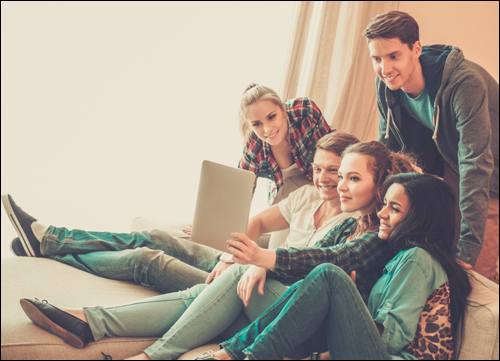group of teenagers on the couch posing for mums magazine