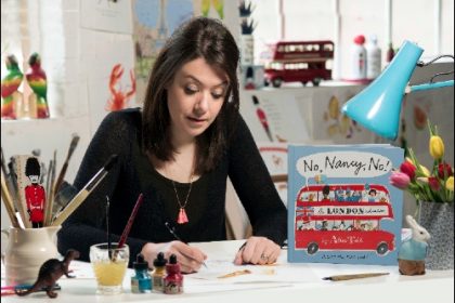 Alice Tait at desk