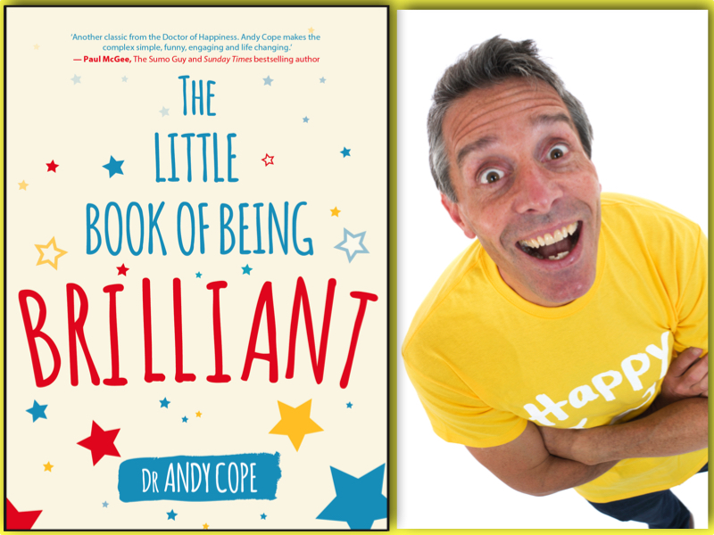 Happiness expert Dr andy cope wearing a yellow shirt posing for mums magazine