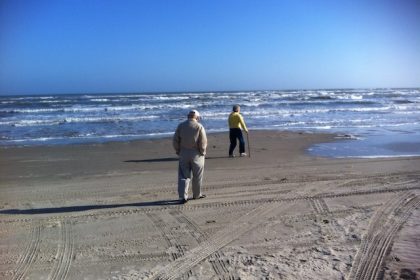 elderly couple on a beach