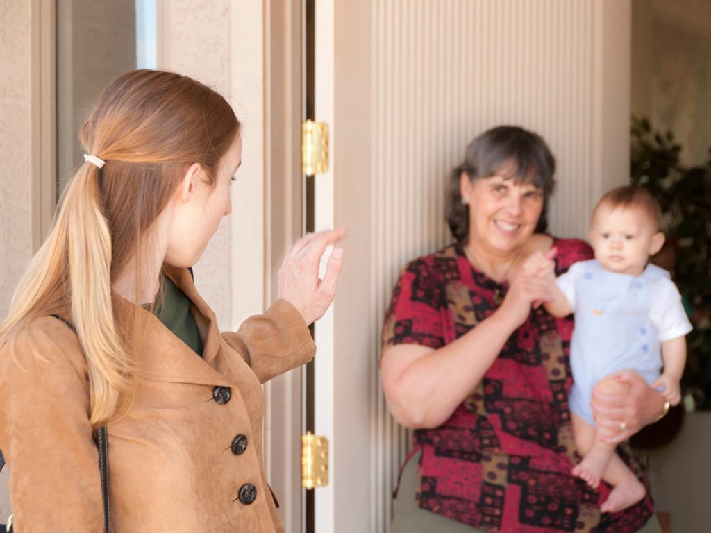 smiley parents and children posing for dating poster for mums magazine 