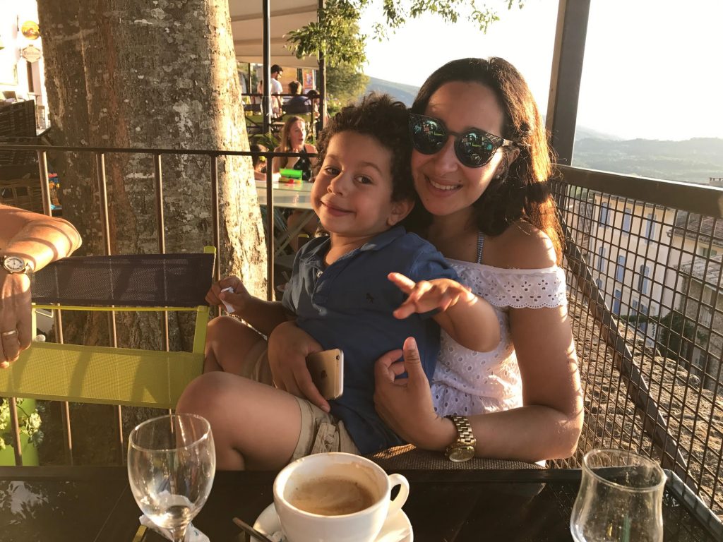 smiley mum and child posing for mums magazine 