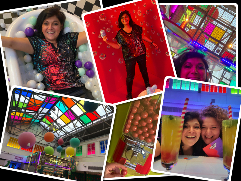 joyful Woman in the bubble tea room at dopamine land in Kensington london posing for mums magazine
