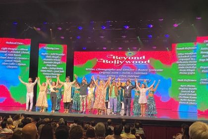 Indian actors on stage of west end show beyond bollywood posing for mums magazine