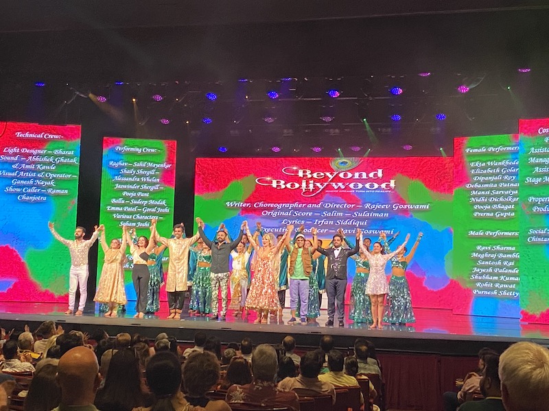 Indian actors on stage of west end show beyond bollywood posing for mums magazine