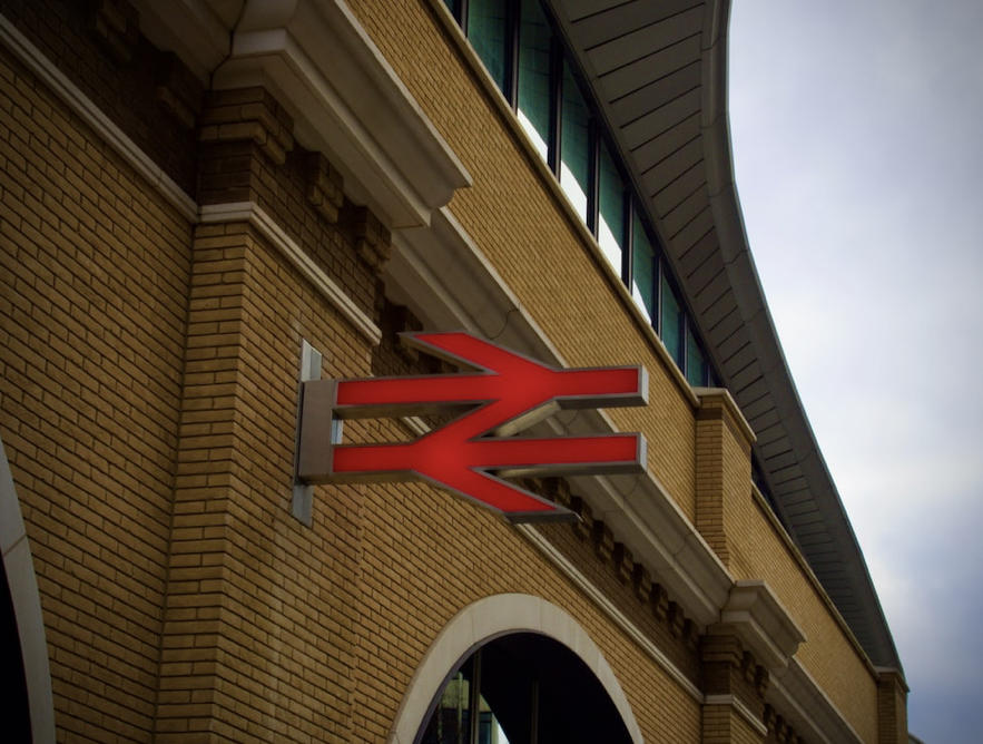 rail signage outside a british train station
