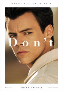 Harry Styles wearing a white shirt in film Don't worry darling posing for mums magazine 