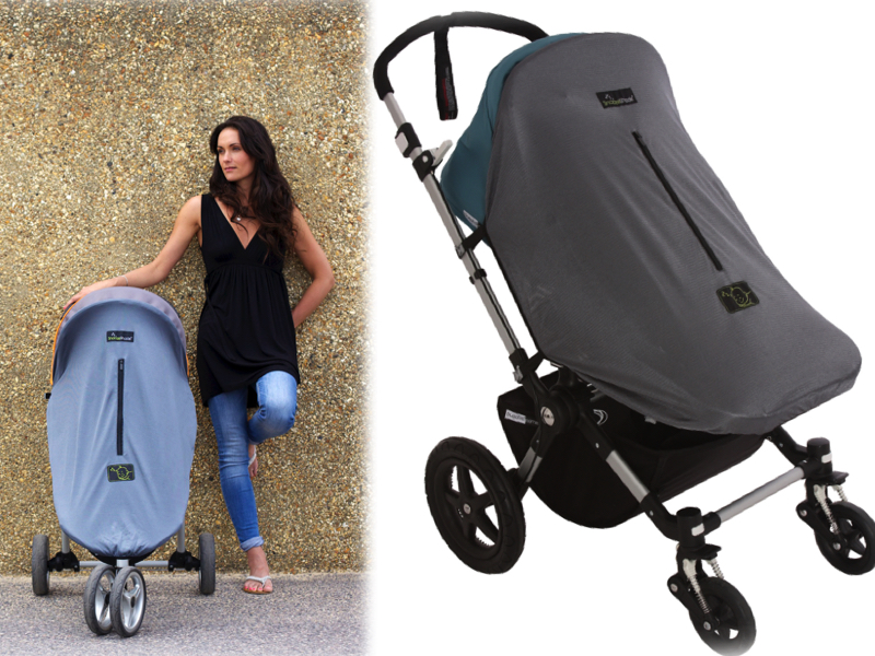 mum with pram trolley with sun shade cover to protect baby posing for mums magazine