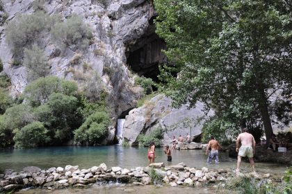 Cueva del gato in Spain wild swimming spot with people relaxing