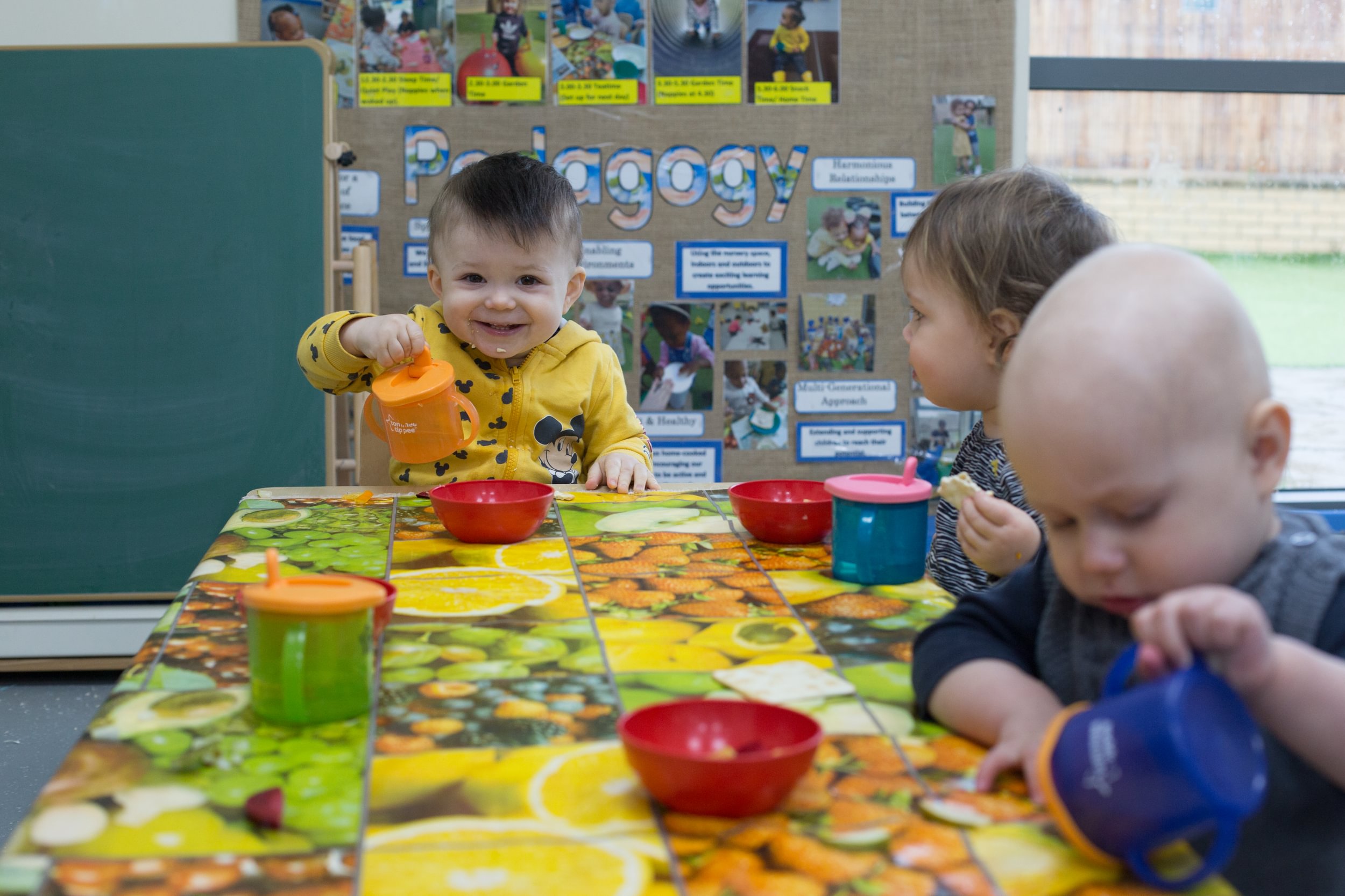 baby and toddlers eating posing for mums magazine