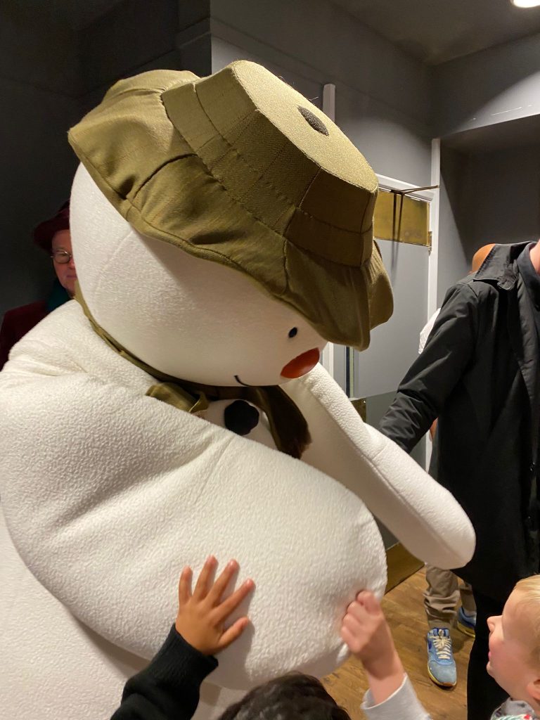 snowman puppet greeting children and posing for mums magazine at peacock theatre