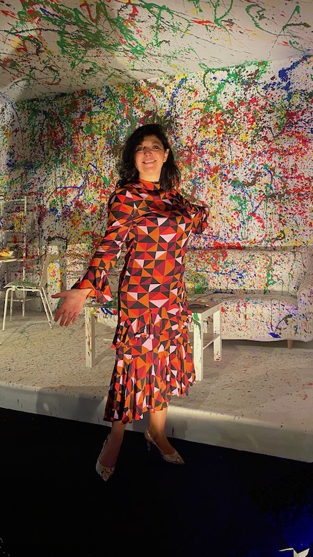 monica costa wearing a colourful dress at nuna party in milano for georgette polizzi posing for mums magazine