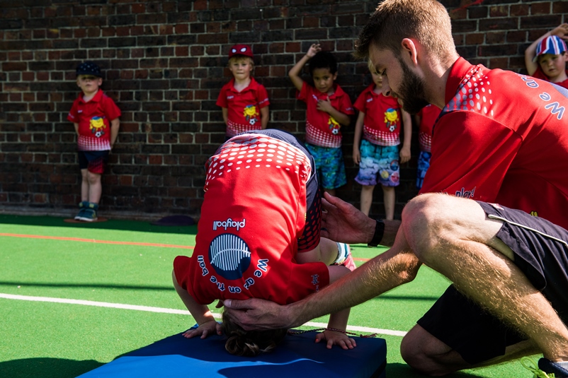 Playball London kids playing roly poly outdoor
