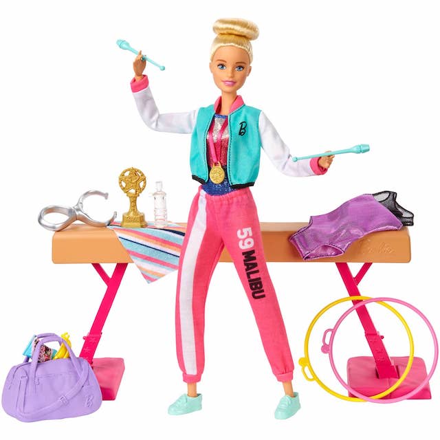 barbie doll in a gym-playset