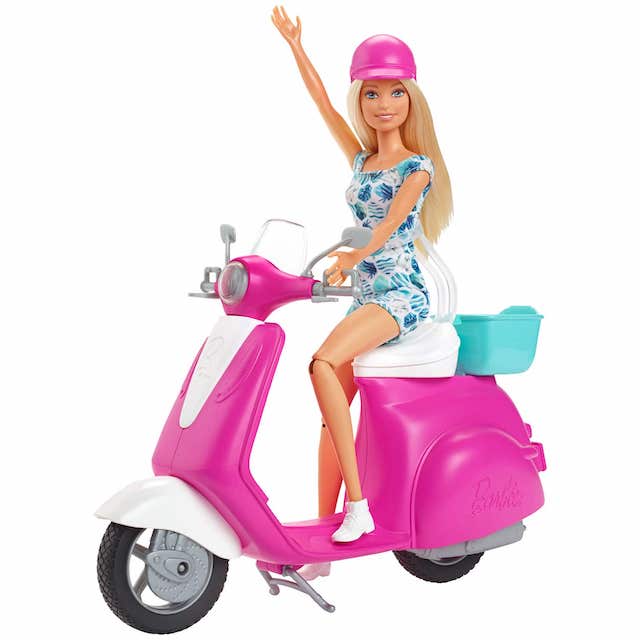 Barbie doll riding a pink scooter