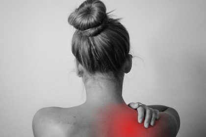 woman's back with shoulder pain