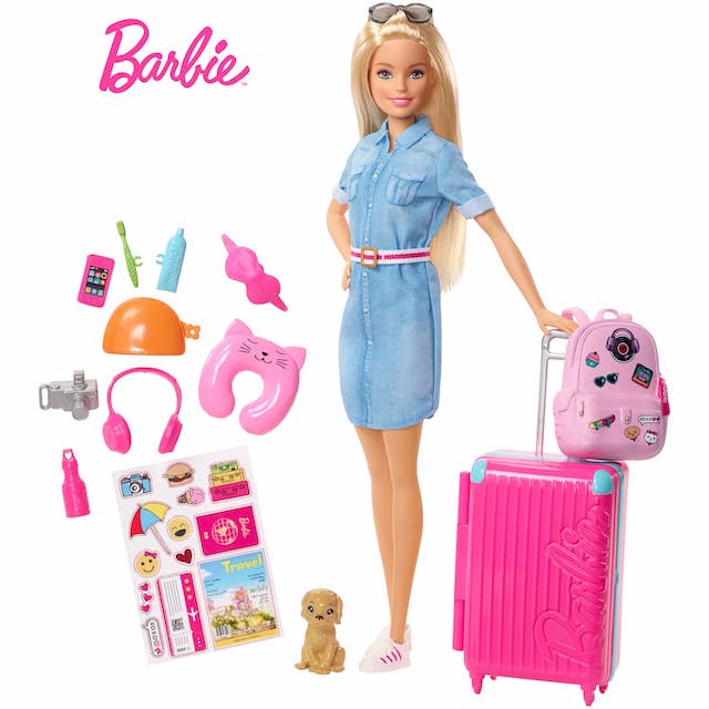 travel barbie doll posing with her accessories for mums magazine
