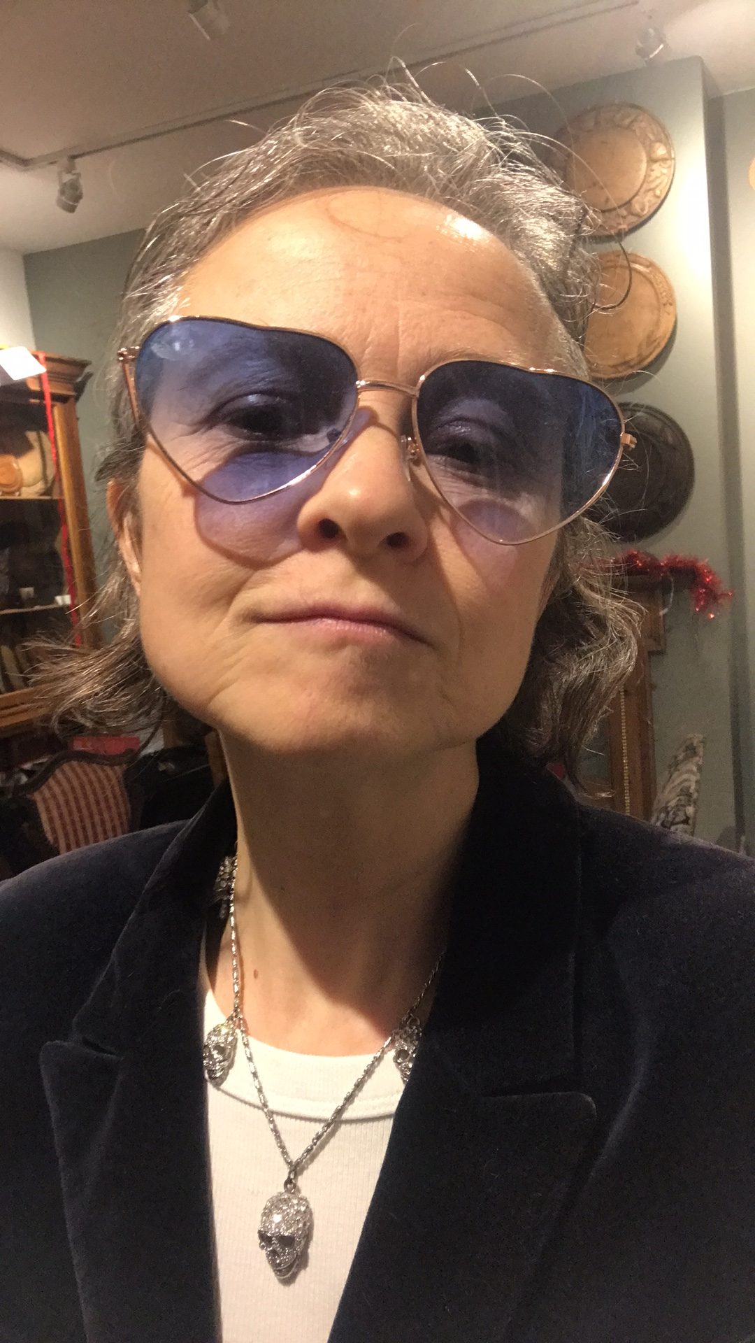 Madeleine with heart shaped glasses ready to go dancing 