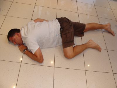 Men lying on the floor waiting for First aid before Ambulance arrival