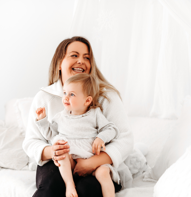 mum embracing her child posing for mums magazine