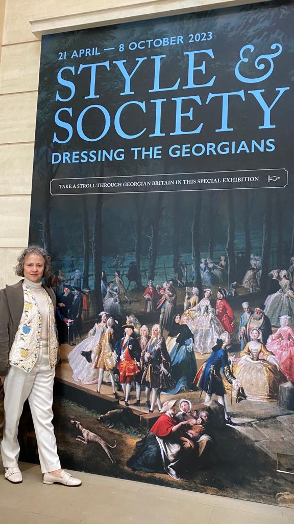 Madeleine attending the exhibition dressing the georgians posing for mums magazine 