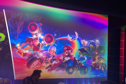 Super Mario Bros movie poster on a cinema screen