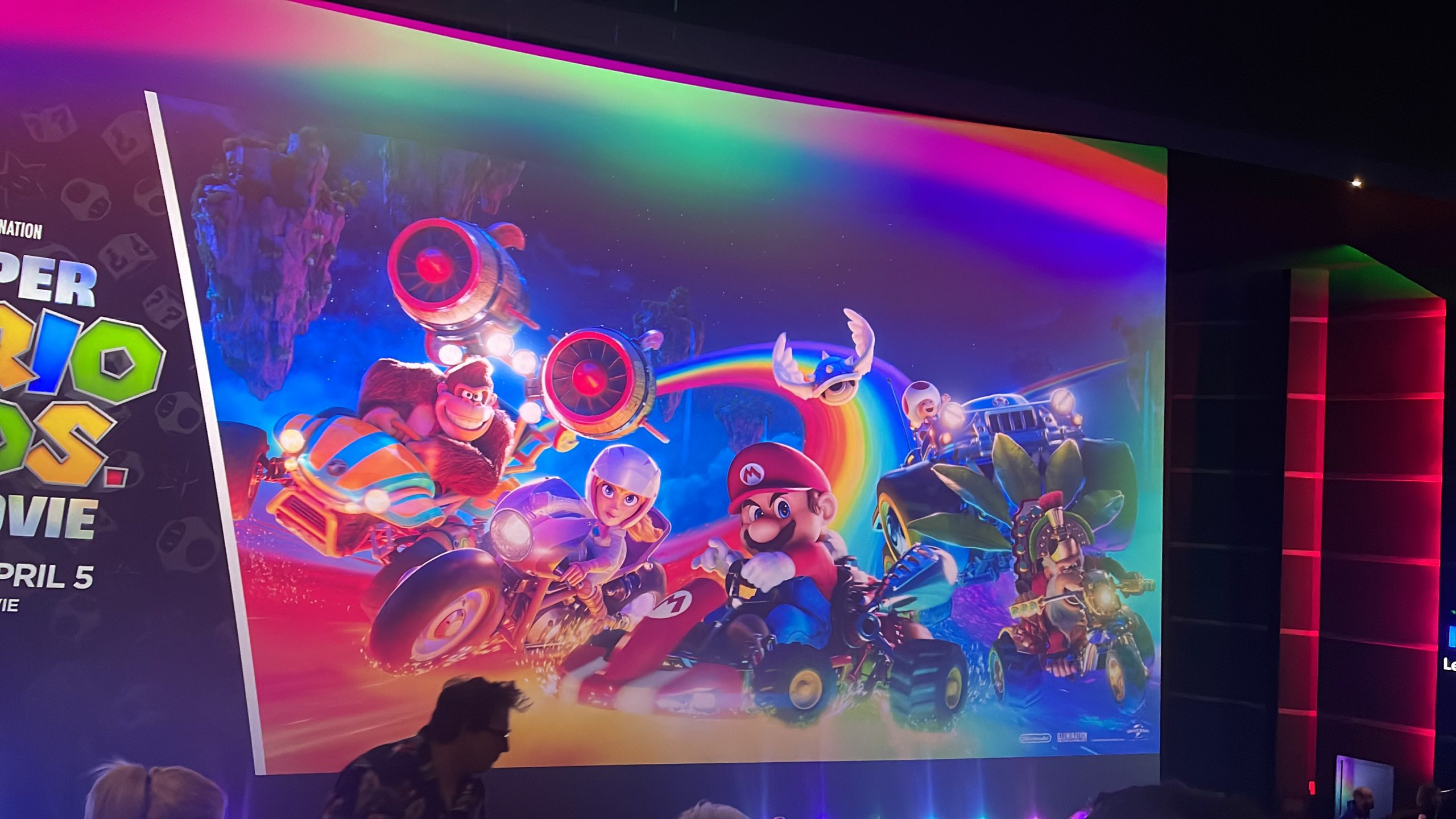 Super Mario Bros Movie poster on a cinema screen