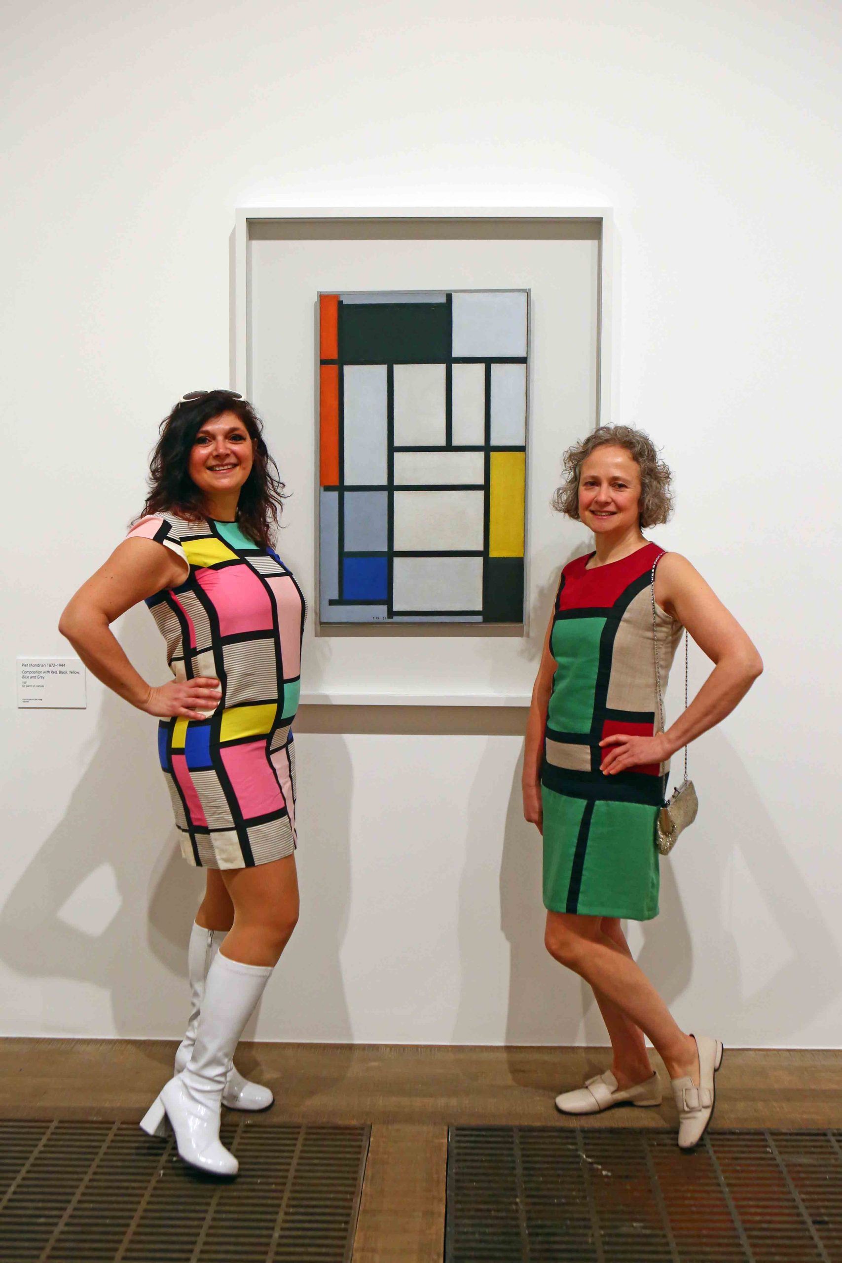 press view for the exhibition Hilma af Klint & Piet Mondrian: Forms of Life, at Tate Modern, London. Pictured are (L-R) Monica Costa and Madeleine Neave from London Mums, beside Piet Mondrian's Composition with Red, Black, Yellow, Blue and Grey. This is the largest presentation of Hilma af Klint's work in the UK to date, with highlights including all ten of her monumental paintings from the series The Ten Largest 1907, presented together in the UK for the first time. It is also the first major UK exhibition in over 25 years to highlight