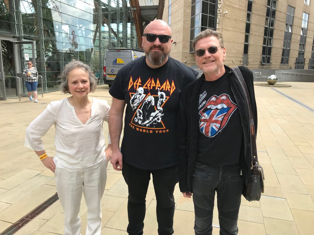 Madeleine, another fan, and Phil Collen, drummer, Def Leppard