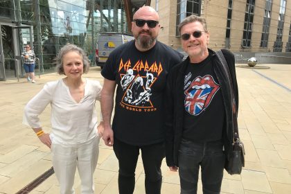 Madeleine, another fan, and Phil Collen, drummer, Def Leppard