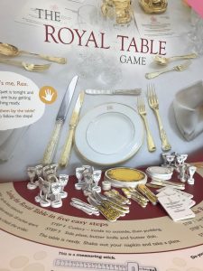 Challenge to learn how to set the table for Royalty, in the Activity Centre