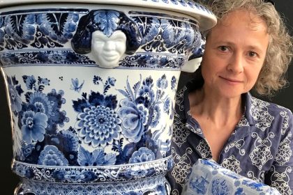 At the Delft Museum with camo blouse and gift wrapped bowl