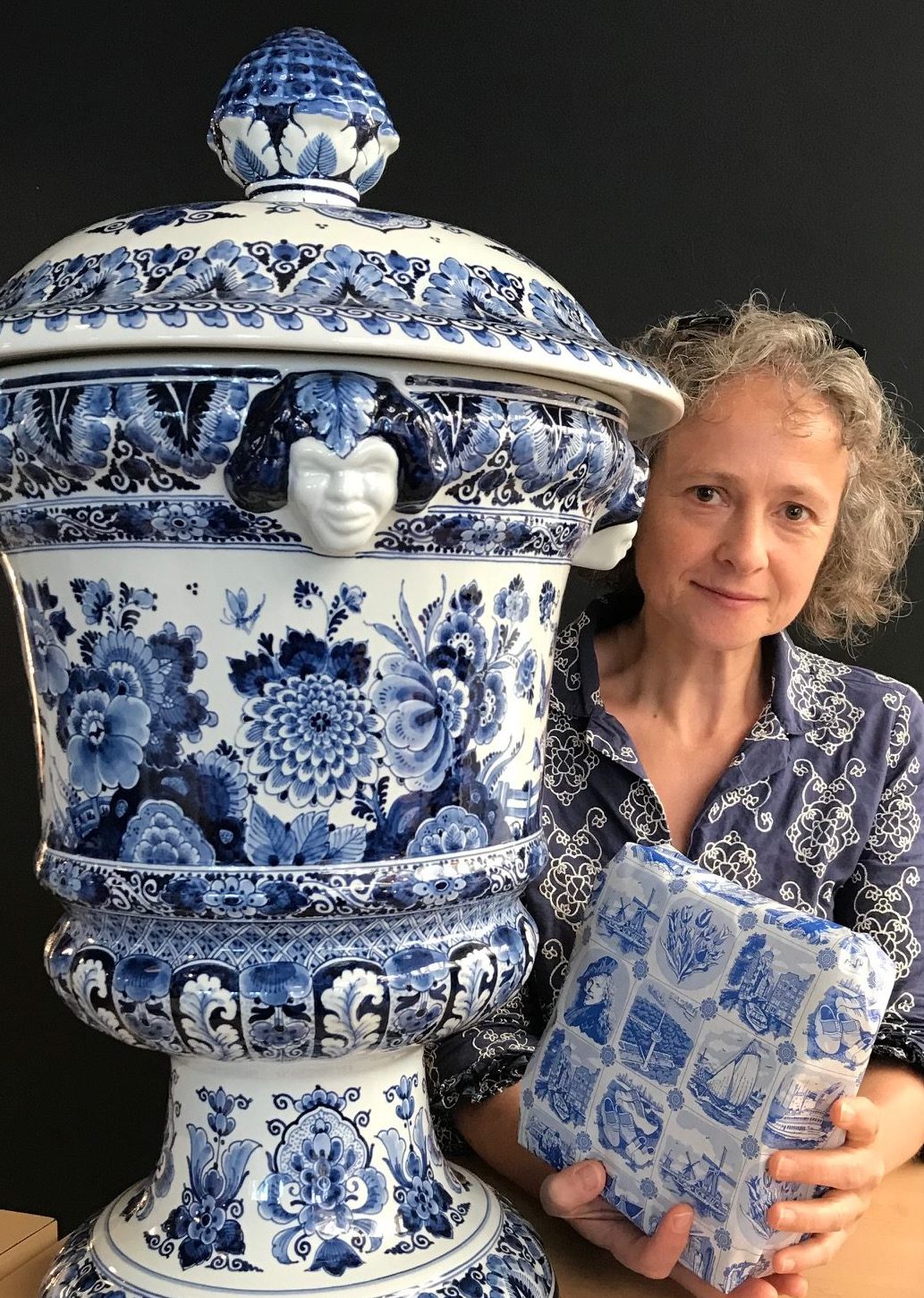 At the Delft Museum with camo blouse and gift wrapped bowl