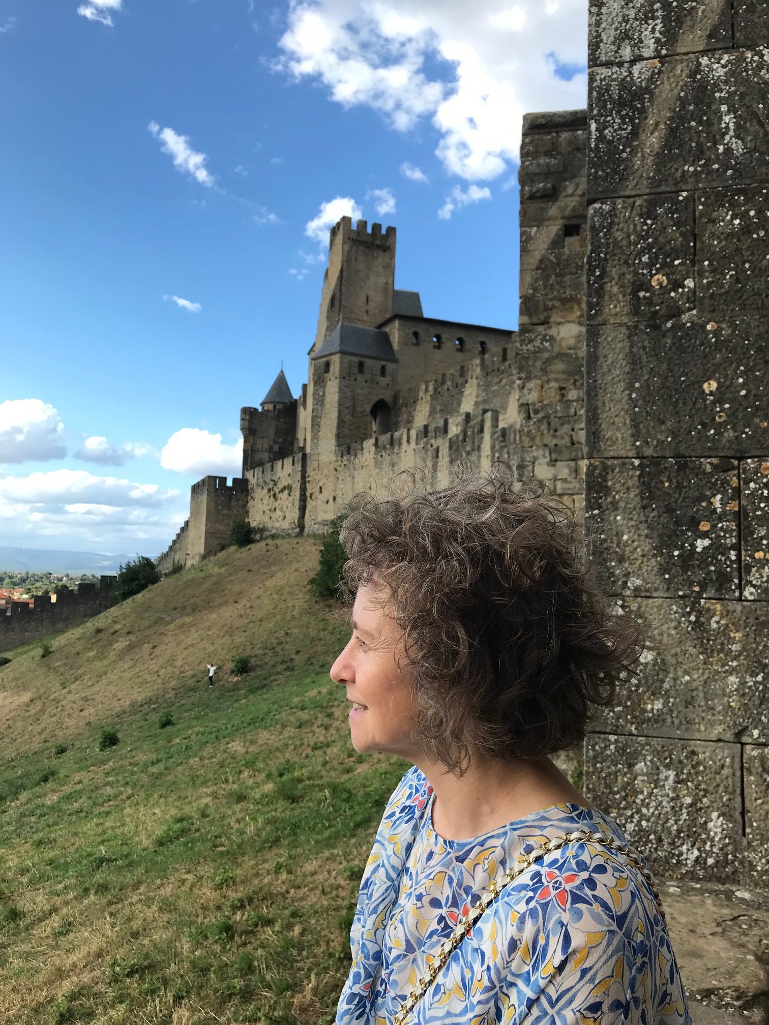 Carcassonne in Occitanie, South-Eastern France, A rest at the west exit, with a great view of the town and valley