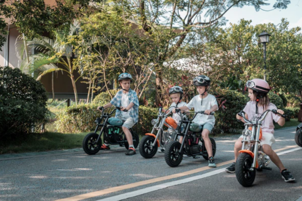 kids driving electric motor bikes