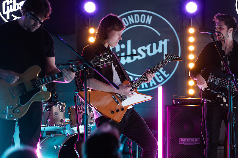 Toby Lee playing guitar at the Gibson garage in London 