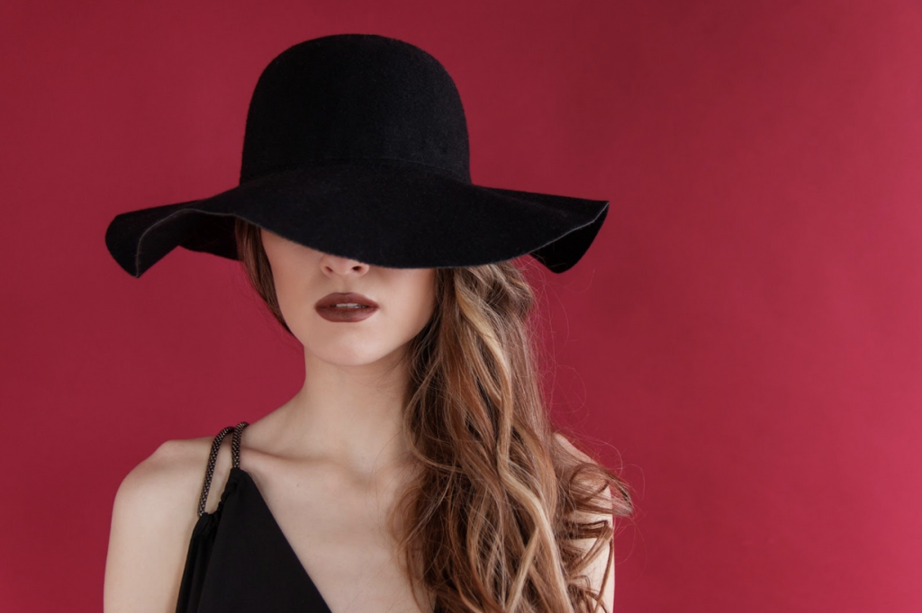 woman with black hat stylish 